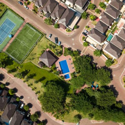 An aerial view of houses of a gated community un Guayaquil, Ecuador. Shot with a drone in a sunny day looking straight down.An aerial view of houses of a gated community un Guayaquil, Ecuador. Shot with a drone in a sunny day looking straight down.